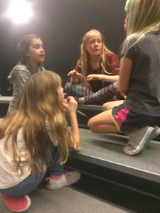 4th graders discussing their play about homelessness